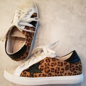 Gorgeous animal print, suede sneakers with black leather star details. EUC